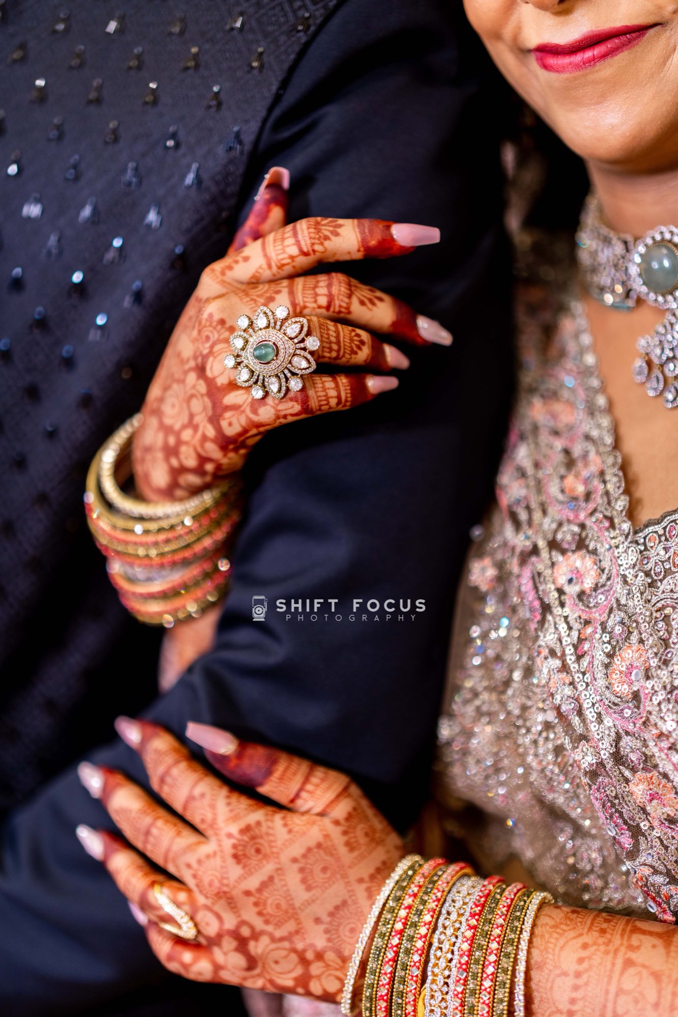 Mehndi hands and the engagement ring