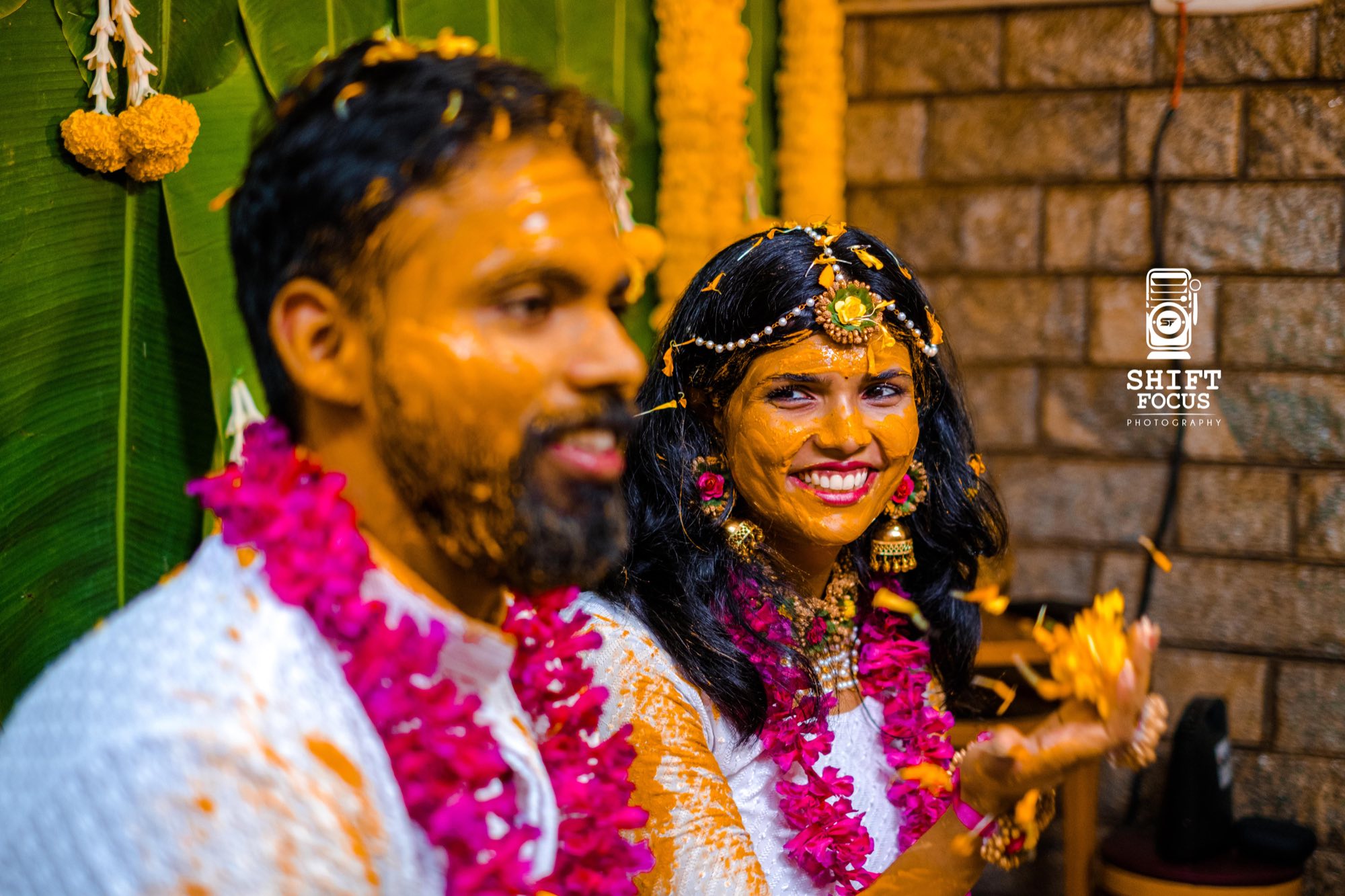 Couple laughing during the haldi