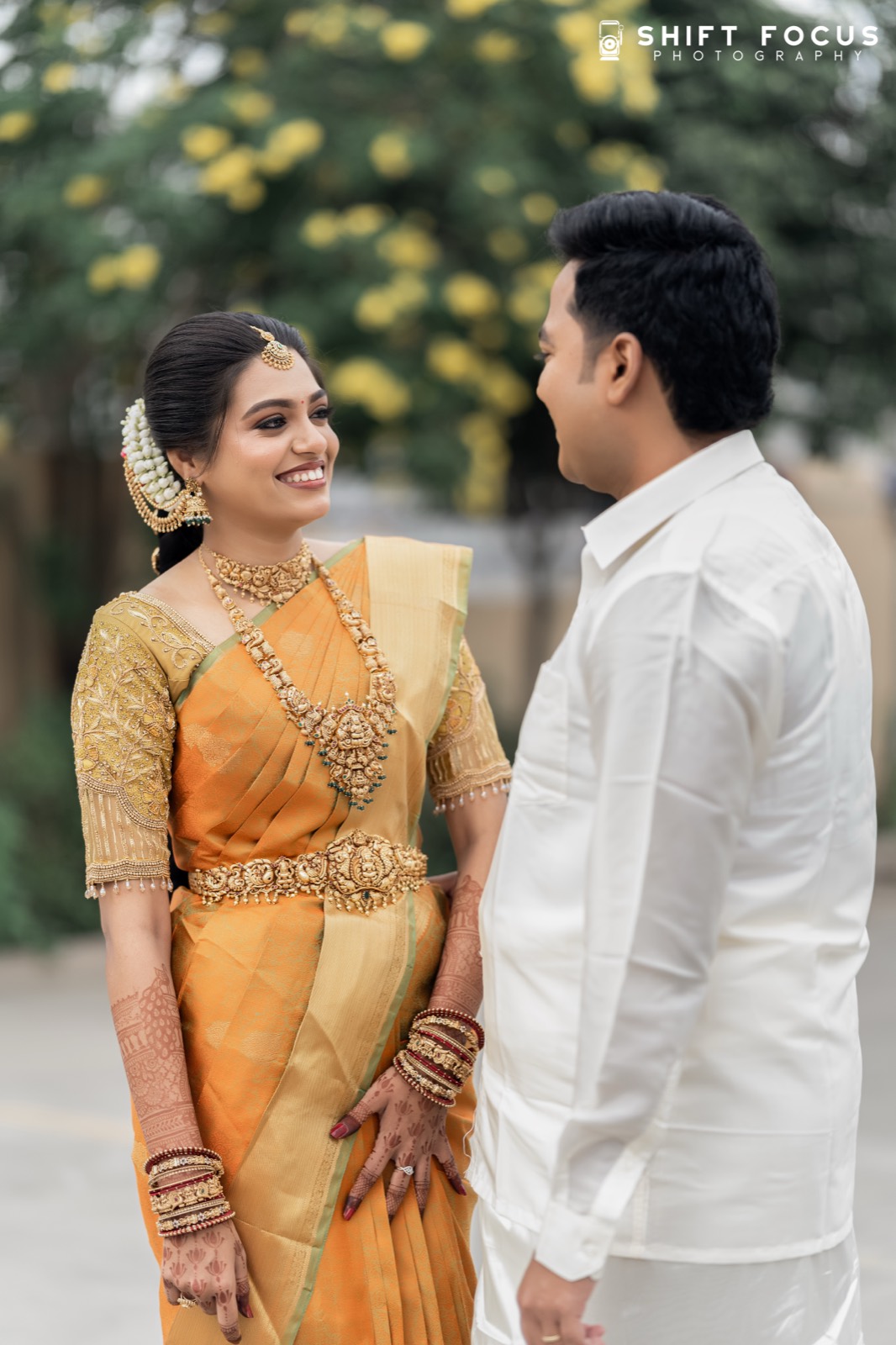 Bride and groom smiling